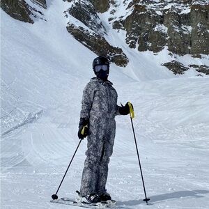 One piece ski/snowboard suit